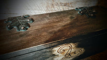 Top view of rustic alter box with oak leaf hinges and handmade copper pins.
